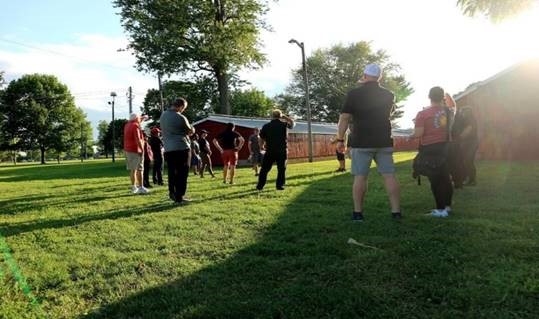 Residents gathered outside at a Safety and Crime Prevention Walk