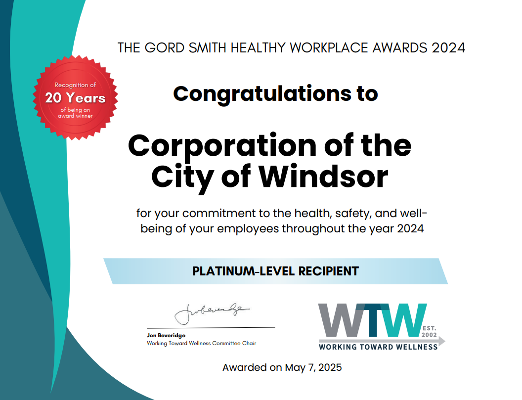 2024 Healthy Workplace Award certificate as presented to the City of Windsor, including congratulations for our commitment to the health, safety, and wellbeing of our employees throughout the year 2024, and recognition as a platinum-level recipient, signed by Jon Beveridge, Working Toward Wellness Committee Chair