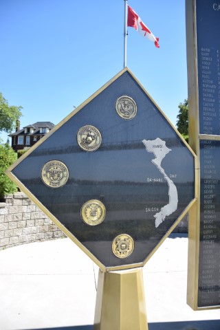 Detail of a memorial list etched into granite.