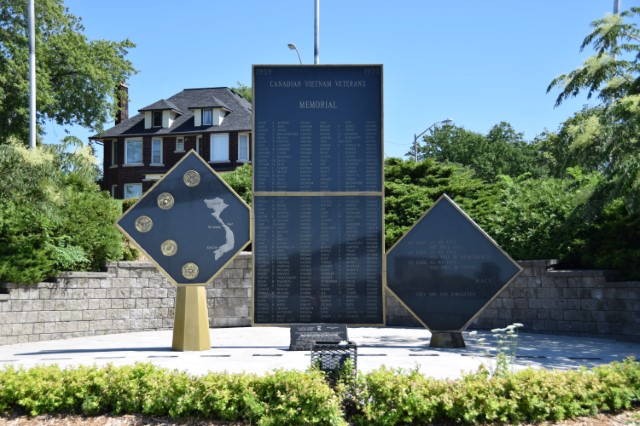 Detail of a memorial list etched into granite.