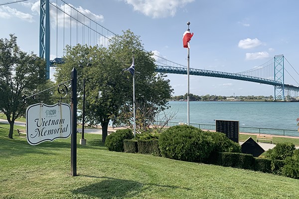 Detail of a memorial list etched into granite.