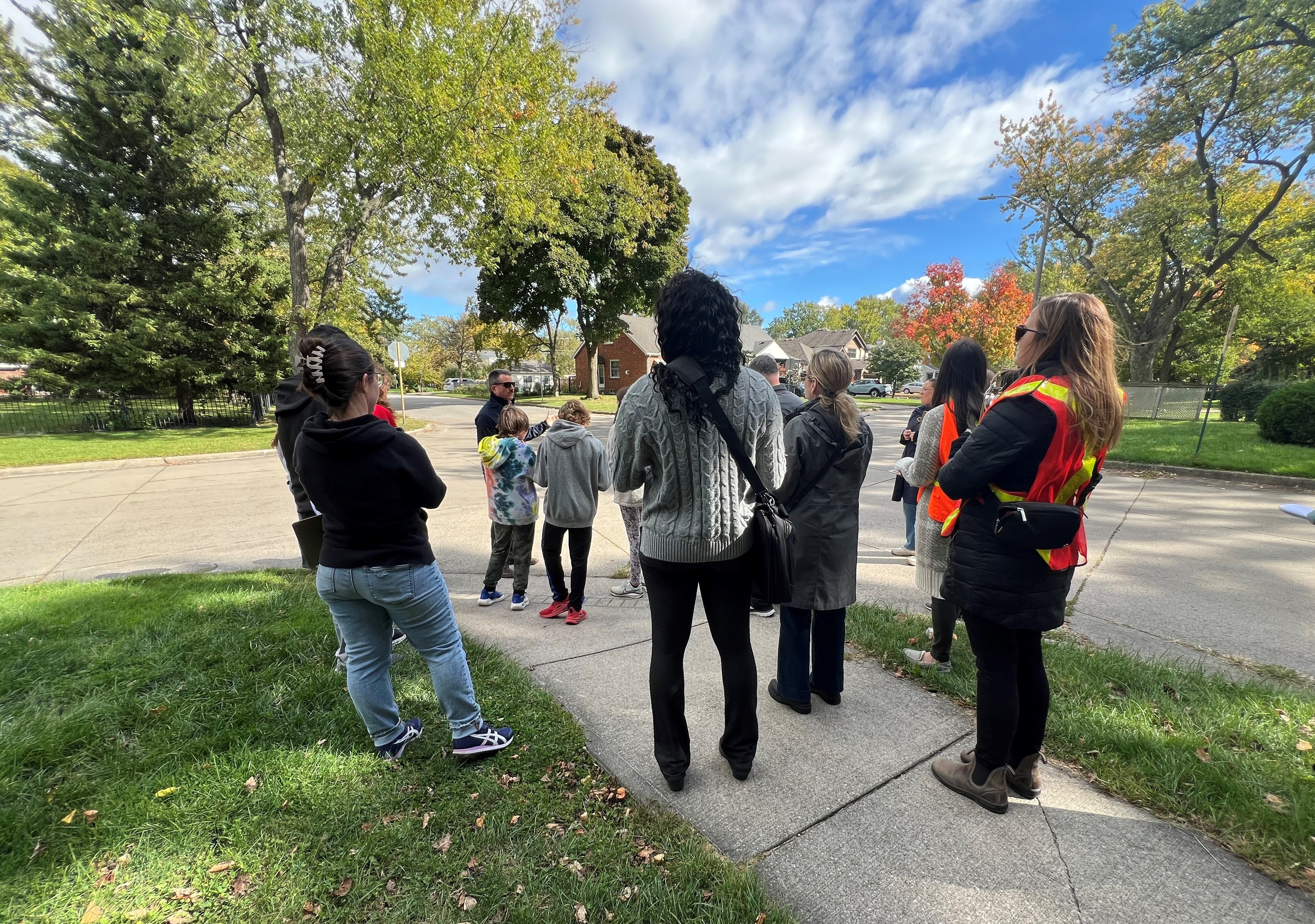 School Safety and Crime Prevention Audit Group Photo Multiple residents gathered on a sidewalk during a School Safety and Crime Prevention Audit