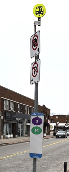 Transit Windsor new bus stop sign at the top of a signpost